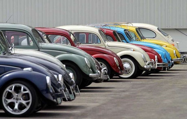 more than 140 volkswagen beetle were gathered to participate in an exhibition at the factory in puebla mexico on august 1 2003 photo afp