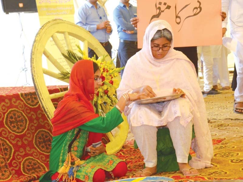 students perform during a play at farmers convention photo uaf