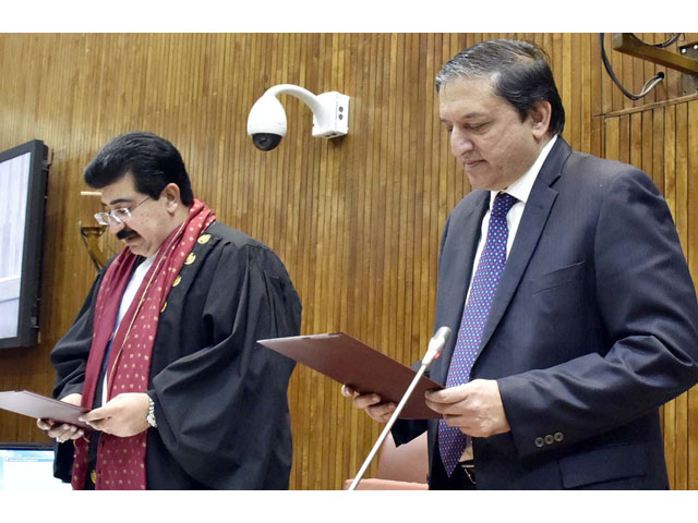 chairman senate sadiq sanjrani administering oath to the newly elected deputy chairman senate saleem mandviwalla at parliament house on march 12 2018 photo inp