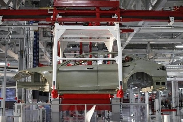 the body of a tesla model s is transported by an automated crane at the tesla factory in fremont california october 1 2011 photo reuters the body of a tesla model s is transported by an automated crane at the tesla factory in fremont california october 1 2011 photo reuters