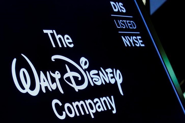 a screen shows the logo and a ticker symbol for the walt disney company on the floor of the new york stock exchange nyse in new york us december 14 2017 photo reuters