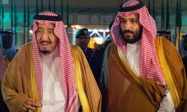 saudi arabia 039 s king salman walks with his son crown prince mohammed bin salman in riyadh photo reuters