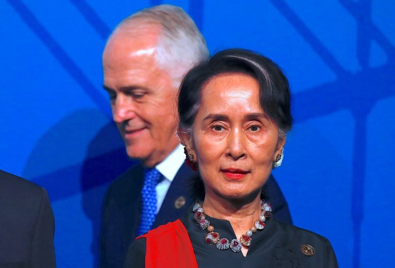 australia 039 s prime minister malcolm turnbull walks behind burma 039 s state counsellor aung san suu kyi during the leaders welcome and family photo at the one off summit of 10 member association of southeast asian nations asean in sydney photo reuters