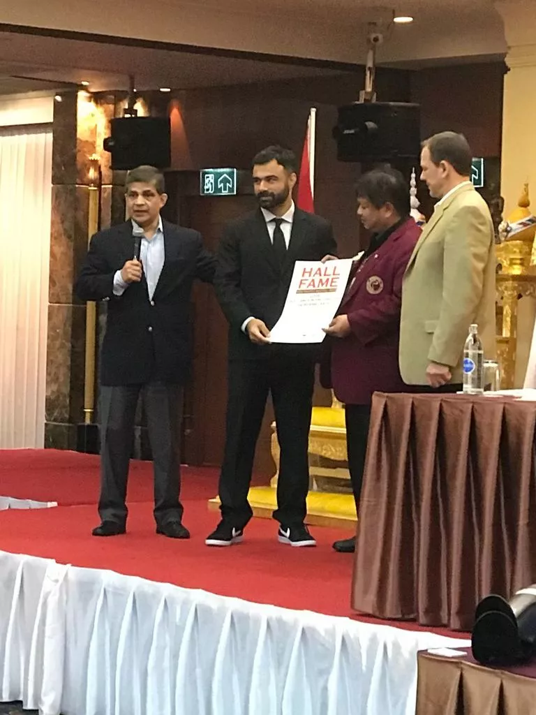 one pakistani to another pakistani american martial artist zulfi ahmad presented the award to bashir ahmed in bangkok photo courtesy bashir ahmed one pakistani to another pakistani american martial artist zulfi ahmad presented the award to bashir ahmed in bangkok photo courtesy bashir ahmed
