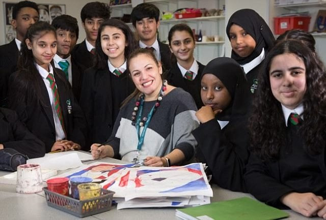 the arts and textiles teacher pictured centre with her pupils learned the greetings for the 35 languages spoken by her pupils so she could talk to them and their parents at the gates photo courtesy dailymail the arts and textiles teacher pictured centre with her pupils learned the greetings for the 35 languages spoken by her pupils so she could talk to them and their parents at the gates photo courtesy dailymail