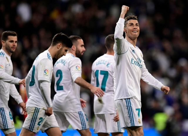 real madrid 039 s portuguese forward cristiano ronaldo celebrates a goal during the spanish league football match between real madrid cf and girona fc at the santiago bernabeu stadium in madrid on march 18 2018 photo afp real madrid 039 s portuguese forward cristiano ronaldo celebrates a goal during the spanish league football match between real madrid cf and girona fc at the santiago bernabeu stadium in madrid on march 18 2018 photo afp