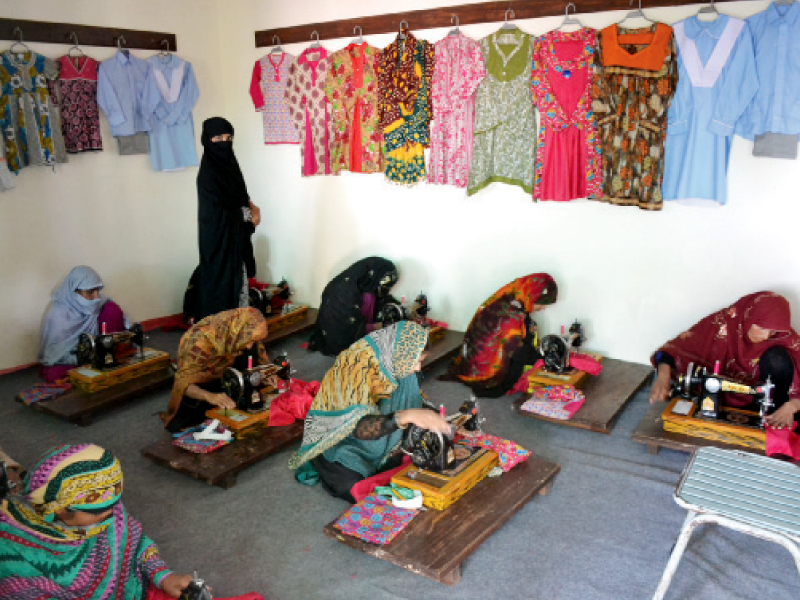 women work in a cottage industry photo file