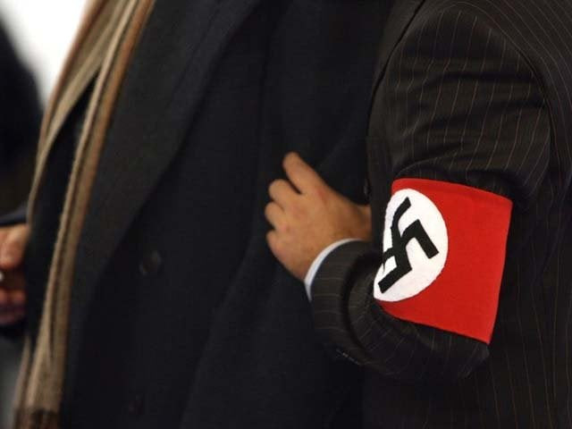 a man wears a costume with a swastika armband photo reuters a man wears a costume with a swastika armband photo reuters