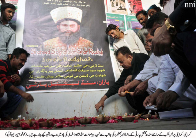 followers in karachi lit candles below a poster of suriya badshah at the press club photo nni followers in karachi lit candles below a poster of suriya badshah at the press club photo nni