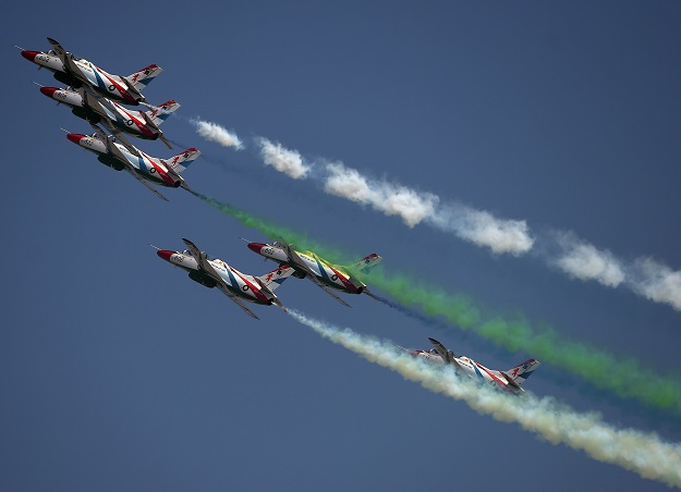 pakistani jets perform aerobatic manouvers during the pakistan day military parade in islamabad on march 23 2018 photo afp