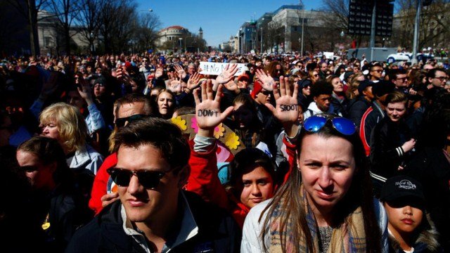 attendees are seen as students and gun control advocates hold the quot march for our lives quot event demanding gun control after recent school shootings at a rally in washington us photo reuters