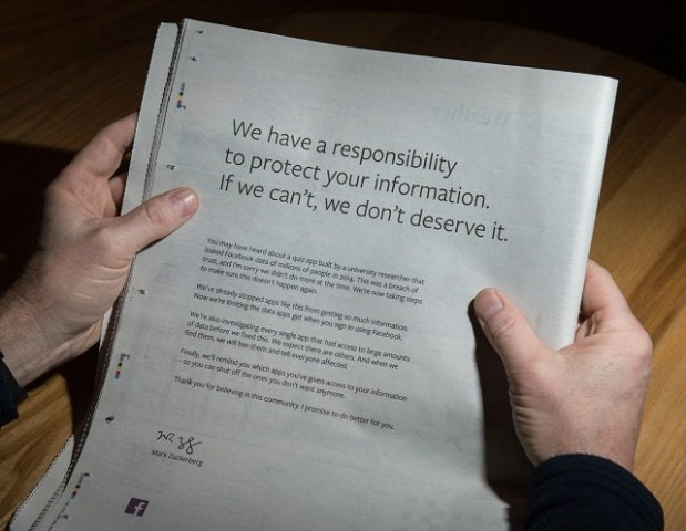 a man reads a full page advertisment taken out by mark zuckerberg on the backpage of a newspaper in ripon england on march 25 2018 photo afp a man reads a full page advertisment taken out by mark zuckerberg on the backpage of a newspaper in ripon england on march 25 2018 photo afp