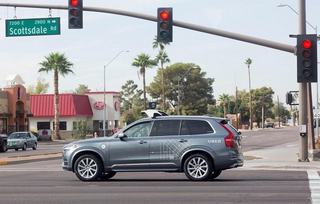 a self driving volvo vehicle purchased by uber moves through an intersection in scottsdale arizona us december 1 2017 photo reuters