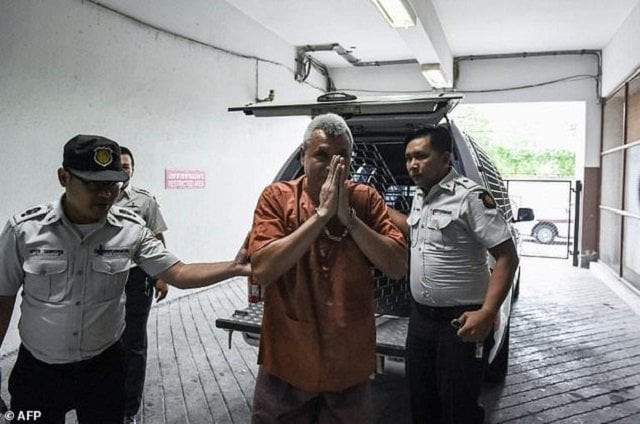 thanat thanawatcharanont a thai court acquitted the folk singer turned activist of his third royal defamation charge on thursday photo afp thanat thanawatcharanont a thai court acquitted the folk singer turned activist of his third royal defamation charge on thursday photo afp