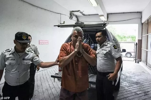 thanat thanawatcharanont a thai court acquitted the folk singer turned activist of his third royal defamation charge on thursday photo afp thanat thanawatcharanont a thai court acquitted the folk singer turned activist of his third royal defamation charge on thursday photo afp