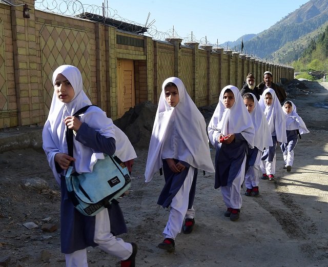 students arrive at the khpal kor model school which was built with malala yousafzai 039 s nobel prize money in malala 039 s home district of shangla in swat region on march 30 2018 photo afp