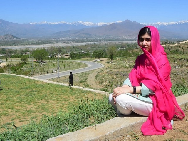 Pakistani activist and Nobel Peace Prize laureate Malala Yousafzai poses for a photograph at all-boys Swat Cadet College Guli Bagh, during her hometown visit, some 15 kilometres outside of Mingora, on March 31, 2018. Malala Yousafzai landed in the Swat valley on March 31 for her first visit back to the once militant-infested Pakistani region where she was shot in the head by the Taliban more than five years ago. / AFPPakistani activist and Nobel Peace Prize laureate Malala Yousafzai poses for a photograph at all-boys Swat Cadet College Guli Bagh, during her hometown visit, some 15 kilometres outside of Mingora, on March 31, 2018. Malala Yousafzai landed in the Swat valley on March 31 for her first visit back to the once militant-infested Pakistani region where she was shot in the head by the Taliban more than five years ago. PHOTO: AFP