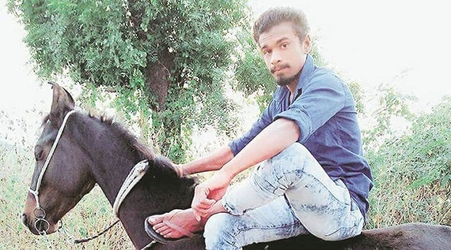 the body of 21 year old pradeep rathod was found in a pool of blood near timbi village in gujarat stat photo courtesy indian express the body of 21 year old pradeep rathod was found in a pool of blood near timbi village in gujarat stat photo courtesy indian express