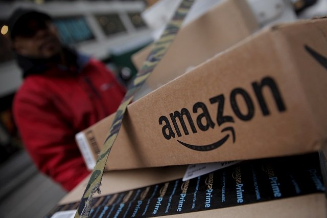 amazon boxes are seen stacked for delivery in the manhattan borough of new york city january 29 2016 photo reuters