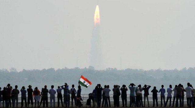 indian onlookers watch the launch of the indian space research organisation isro polar satellite launch vehicle pslv c37 at sriharikota photo afp indian onlookers watch the launch of the indian space research organisation isro polar satellite launch vehicle pslv c37 at sriharikota photo afp