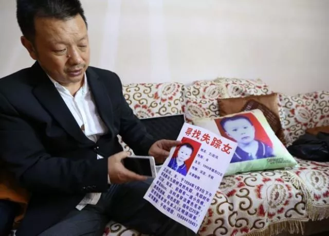 for years wang mingqing handed out leaflets appealing for information about his missing daughter photo courtesy bbc for years wang mingqing handed out leaflets appealing for information about his missing daughter photo courtesy bbc