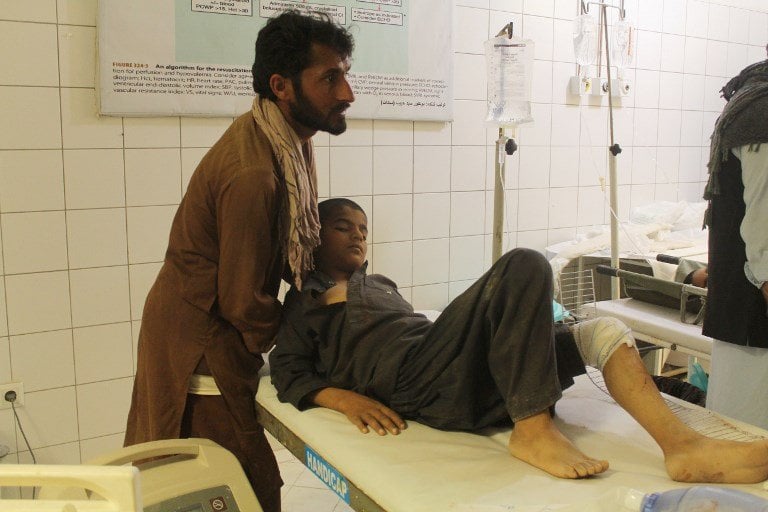 an afghan resident is treated at a hospital following an airstrike in kunduz photo afp