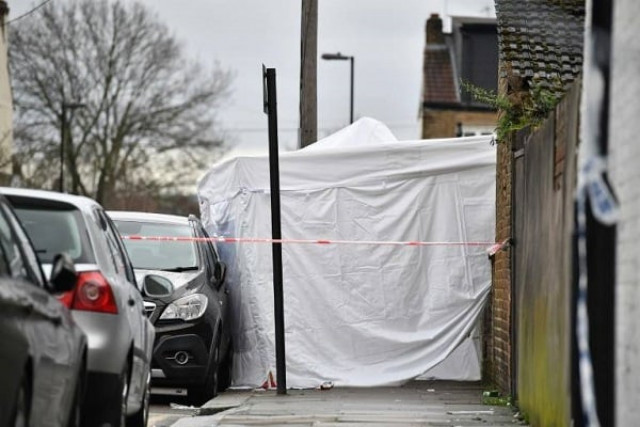 a police forensics tent at the scene of the fatal shooting of a teenager in north london on monday night photo afp a police forensics tent at the scene of the fatal shooting of a teenager in north london on monday night photo afp