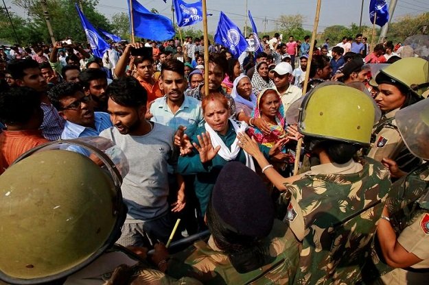 mob burns homes in fresh india caste violence
