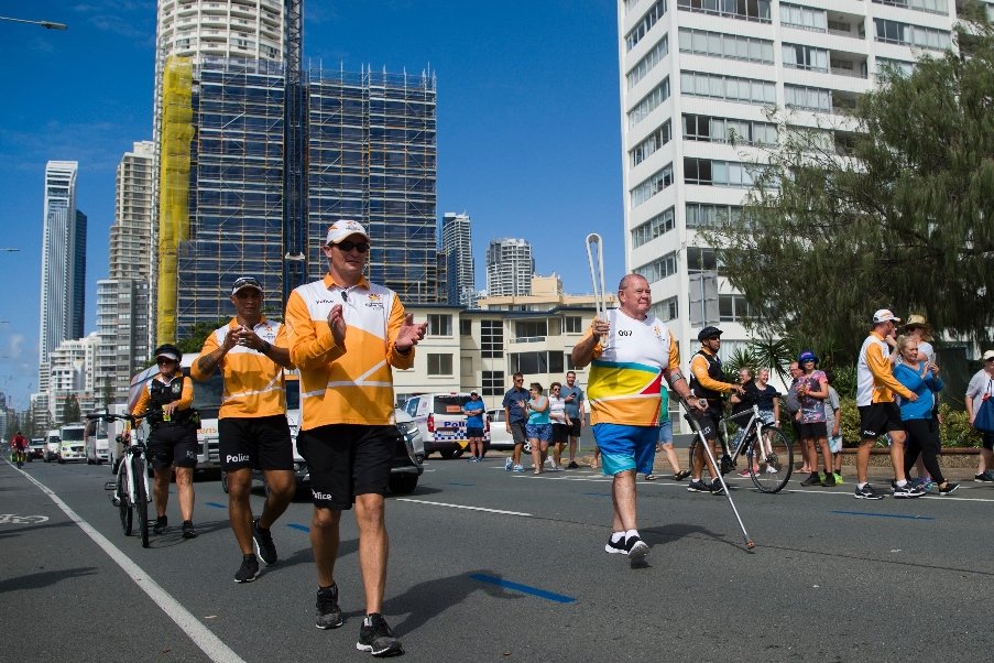 michael o 039 shannassy c former disabled athlete carries the queen 039 s baton ahead of the 2018 gold coast commonwealth games photo afp