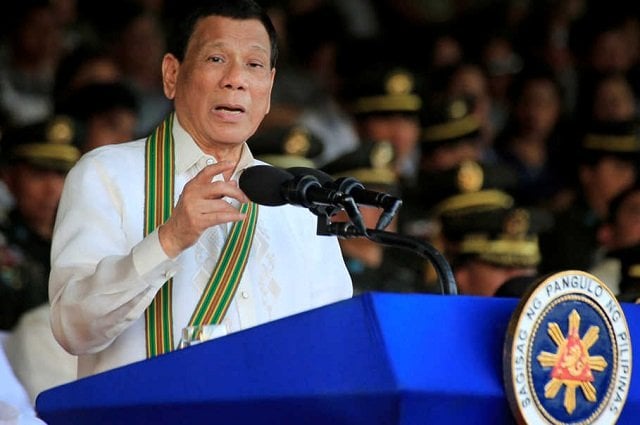 philippine president rodrigo duterte gestures as he delivers a speech during the 121st founding anniversary of the philippine army at taguig city metro manila philippines march 20 2018 photo reuters