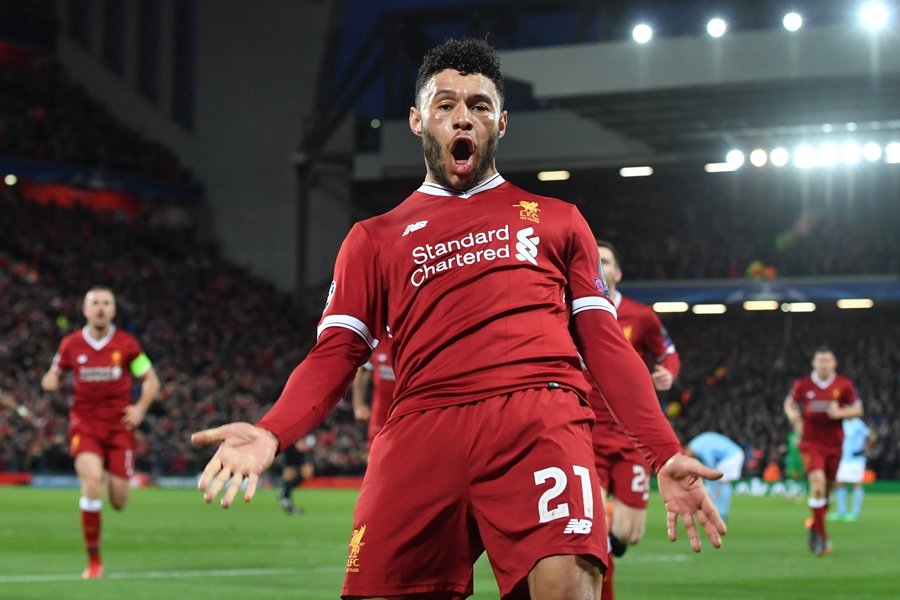 liverpool 039 s english midfielder alex oxlade chamberlain celebrates scoring the team 039 s second goal during the uefa champions league first leg quarter final football match between liverpool and manchester city at anfield stadium in liverpool north west england on april 4 2018 photo afp