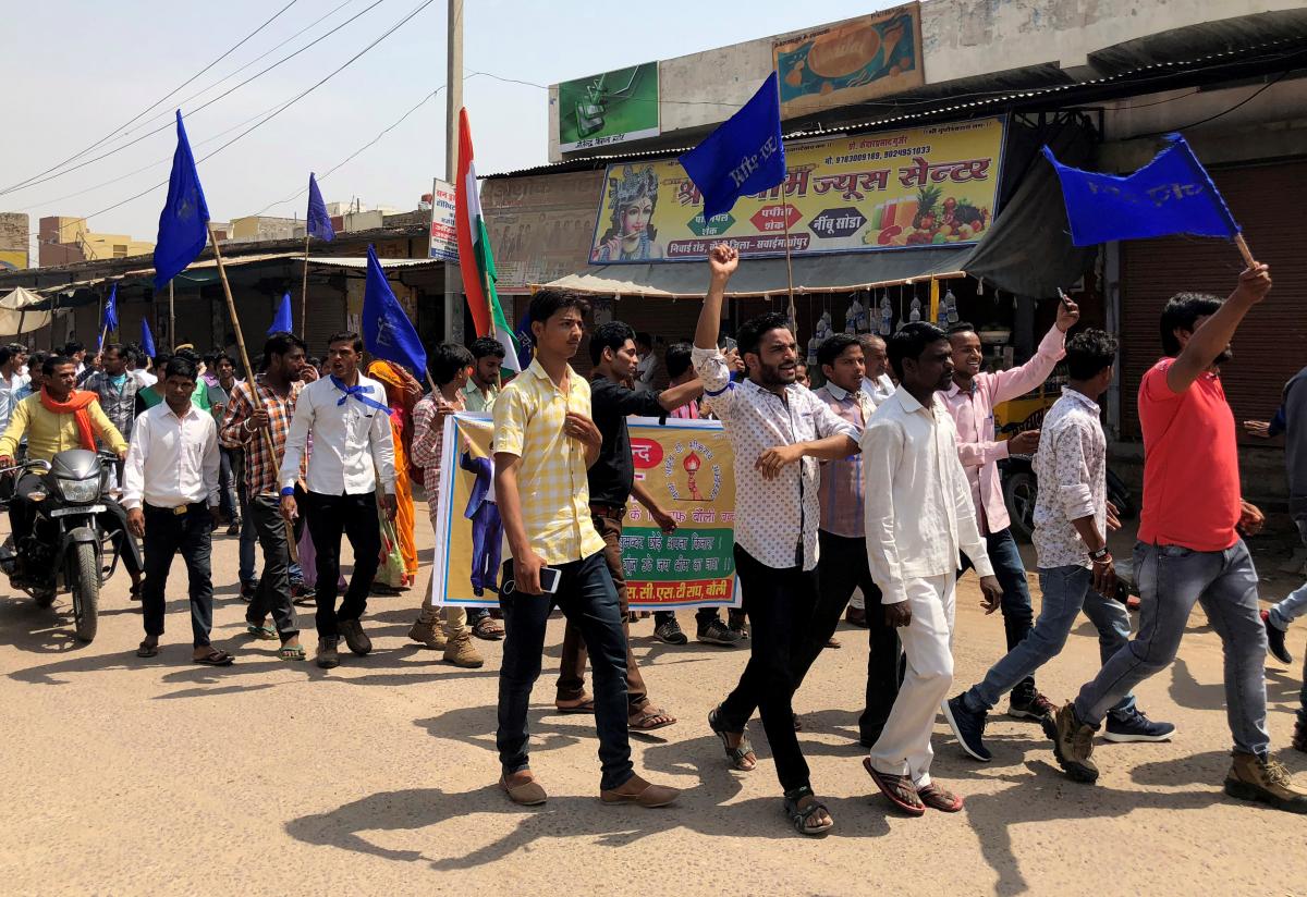people belonging to the dalit community shout slogans as they take part in a nationwide strike called by several dalit organisations in kasba bonli in rajasthan india april 2 2018 photo reuters