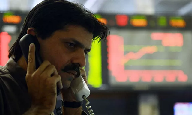 settles with pared gains at mid day break as analysts weigh in on massive tax incentives announced by pm photo afp