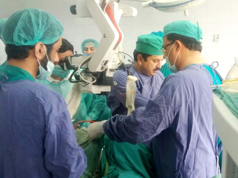 hinge laminoplasty ath surgeons remove spinal tumour from young girl