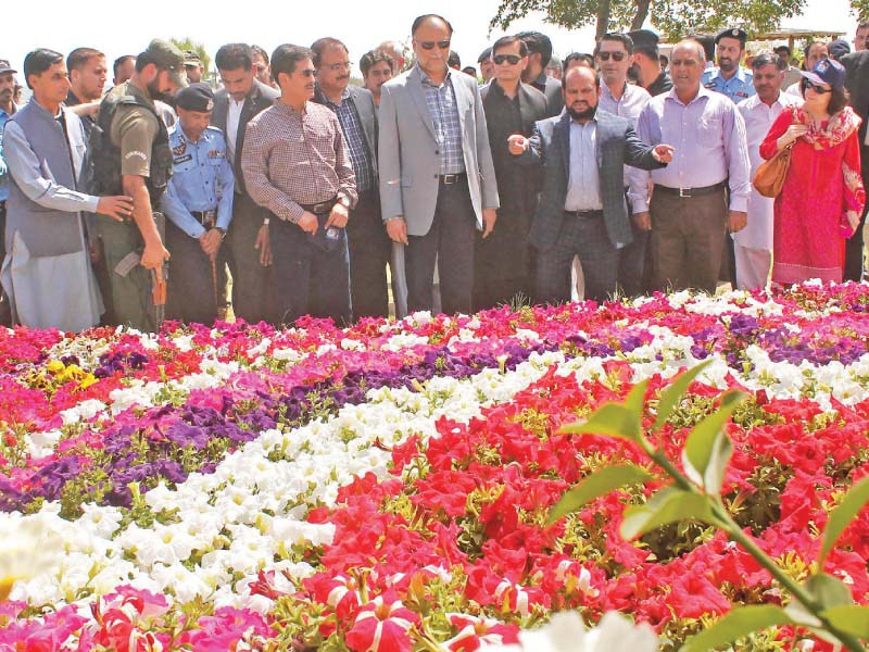 interior minister ahsan iqbal views flower exhibition at spring festival photo online