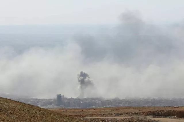 smoke billows in the town of douma the last opposition holdout in syria 039 s eastern ghouta on april 7 2018 after syrian troops resumed a military blitz to pressure rebels to withdraw photo afp smoke billows in the town of douma the last opposition holdout in syria 039 s eastern ghouta on april 7 2018 after syrian troops resumed a military blitz to pressure rebels to withdraw photo afp