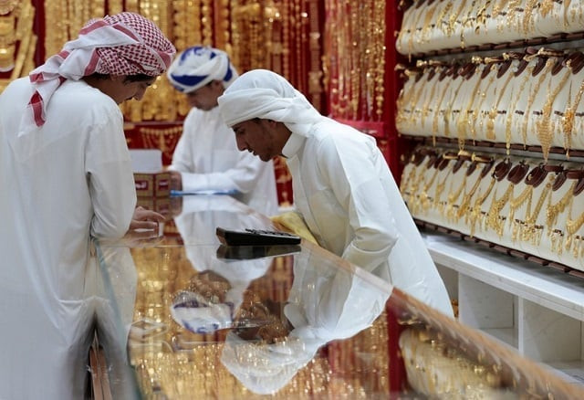 men look at gold jewellery in a shop at the gold souq in dubai united arab emirates march 24 2018 picture taken march 24 2018 photo reuters men look at gold jewellery in a shop at the gold souq in dubai united arab emirates march 24 2018 picture taken march 24 2018 photo reuters