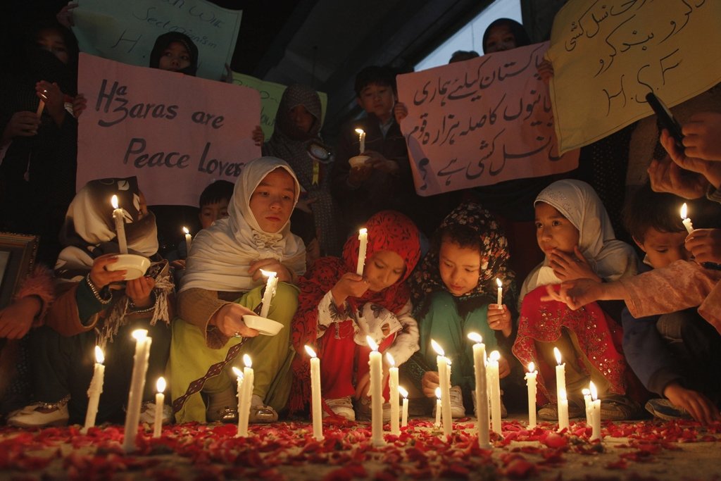 members of a hazara community light candles for peace against sectarian attacks in quetta february 15 2014 photo reuters