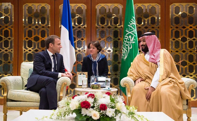 saudi crown prince muhammad bin salman and emmanuel macron during their meeting in paris on sunday photo reuters