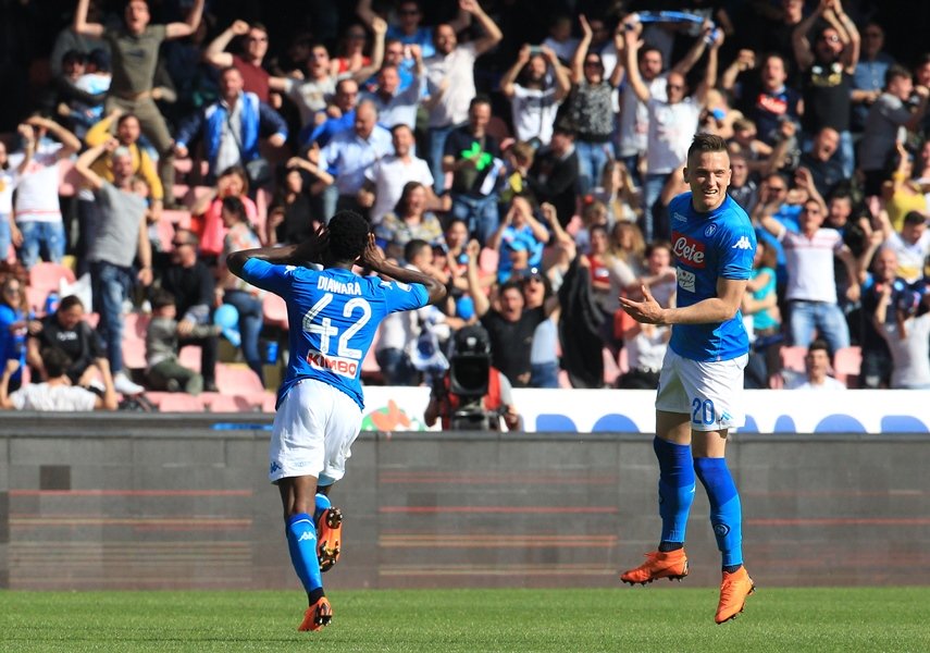 napoli 039 s guinean midfielder amadou diawara l celebrates after scoring a goal next to napoli 039 s polish midfielder piotr zielinski during the italian serie a football match ssc napoli vs ac chievo verona on april 8 2018 at the san paolo stadium in naples photo afp