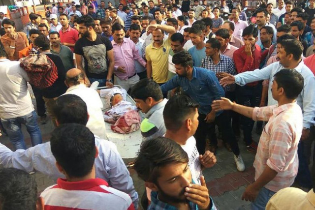 images from the scene showed injured children being carried away bloodied and bruised some on stretchers and others in the arms of bystanders photo afp images from the scene showed injured children being carried away bloodied and bruised some on stretchers and others in the arms of bystanders photo afp