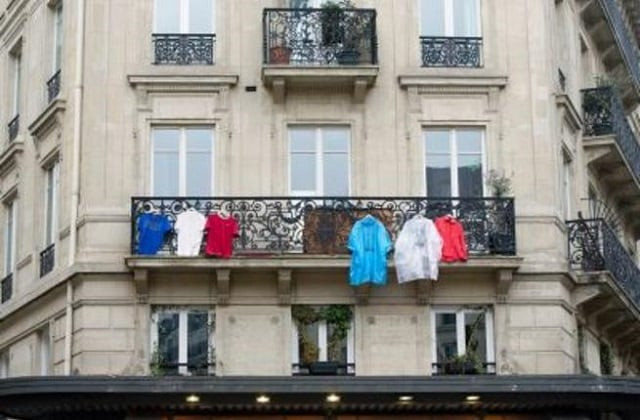 hanging out your clothes on the balcony in kuwait will now subject you to a hefty fine this is the new municipal regulations photo afp