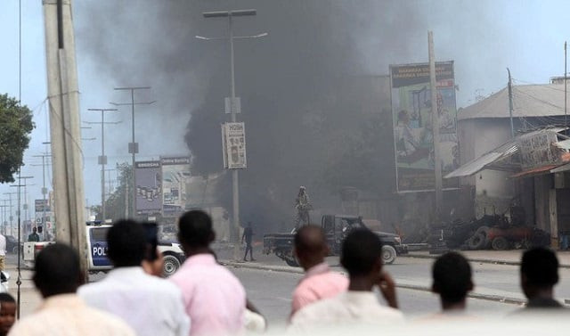 civilians look on as smoke billows from the scene of an explosion at a security checkpoint in the hodan district of mogadishu somalia has been wrecked by violence during the past days photo reuters file civilians look on as smoke billows from the scene of an explosion at a security checkpoint in the hodan district of mogadishu somalia has been wrecked by violence during the past days photo reuters file