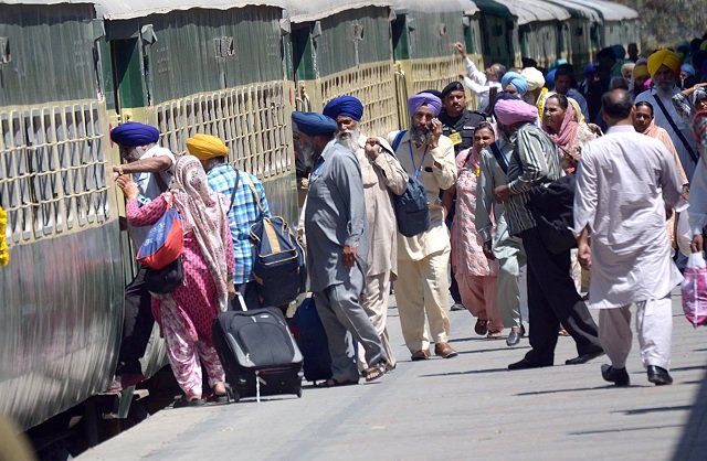 sikh yatrees boarding on hassan abdal bounded train at wagah railway station photo online