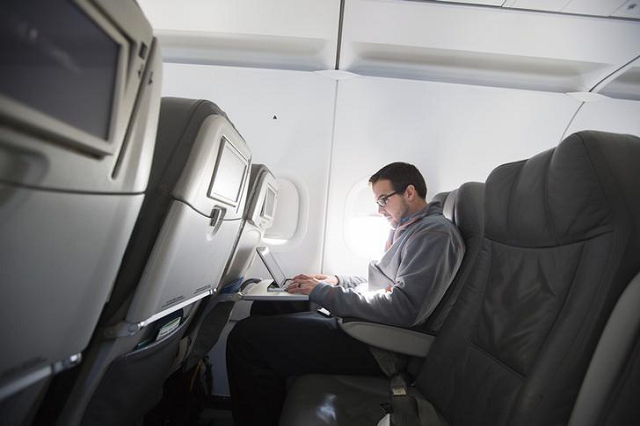 a man uses his laptop on a flight out of john f kennedy international airport in new york december 11 2013 photo reuters