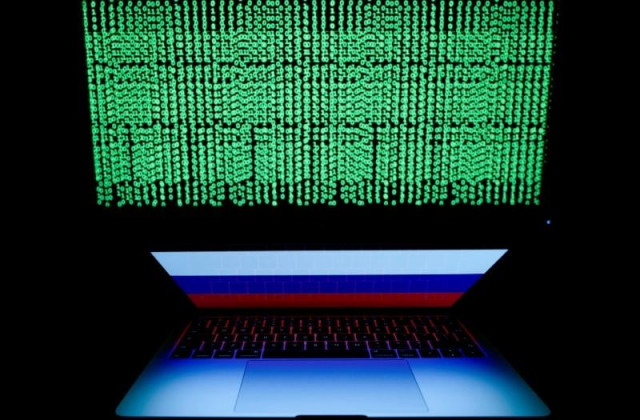 a russian flag is seen on the laptop screen in front of a computer screen on which cyber code is displayed in this illustration picture taken march 2 2018 photo reuters a russian flag is seen on the laptop screen in front of a computer screen on which cyber code is displayed in this illustration picture taken march 2 2018 photo reuters