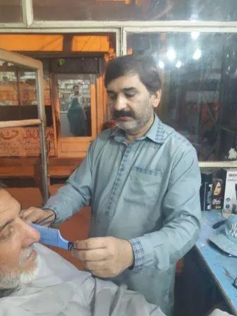 ghulam ali the deaf and mute barber in his shop in rawalpindi ghulam ali the deaf and mute barber in his shop in rawalpindi