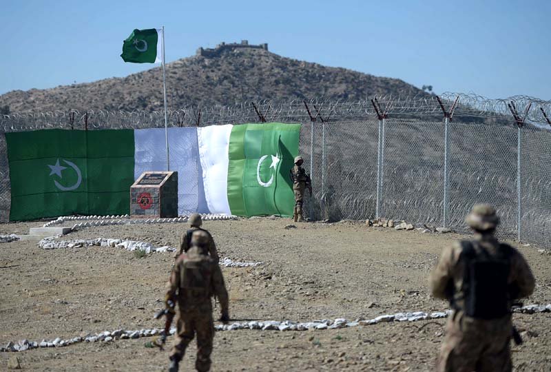 sealing frontier a pakistani soldier keeps vigil at the border fencing along with afghanistan 039 s paktika province in angoor adda south waziristan agency photo afp