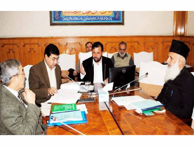 k p finance minister muzaffar presiding over a meeting regarding nfc at civil secretariat photo express k p finance minister muzaffar presiding over a meeting regarding nfc at civil secretariat photo express