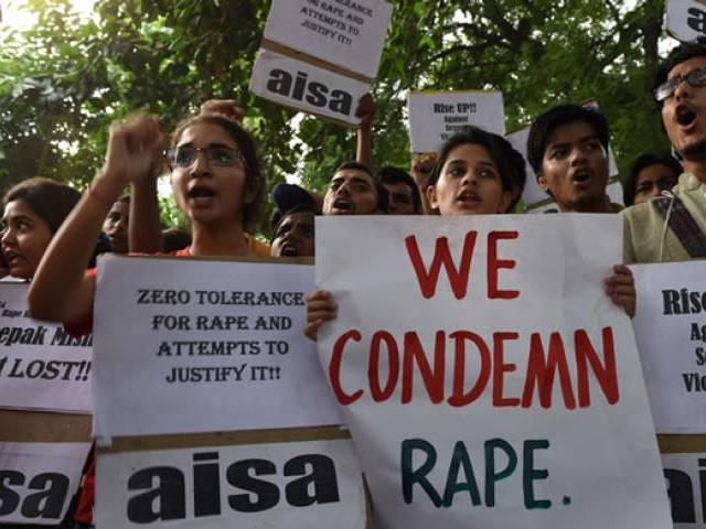 Photo of Indian police officer arrested for ‘raping’ gang-rape victim